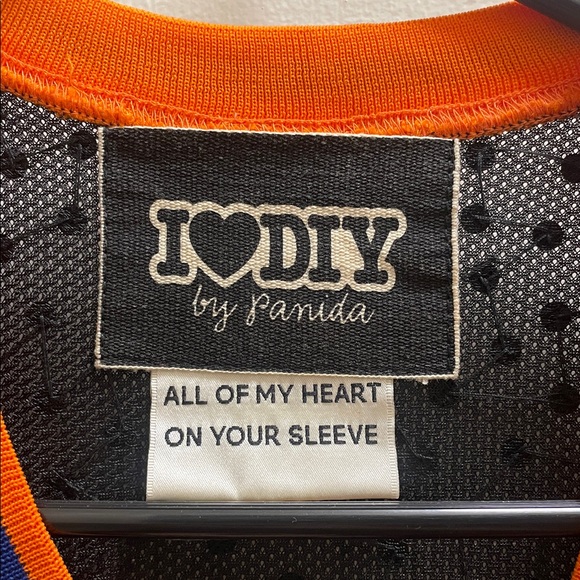 Supreme Black Jersey with Orange and Blue Accents - Picture 3 of 3